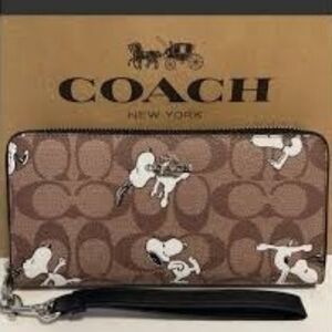 Coach X Peanuts Long Zip Around Wallet In Signature Canvas With Snoopy Print